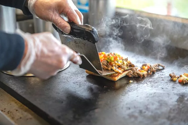Preventing the rust by coating the surface of the griddle