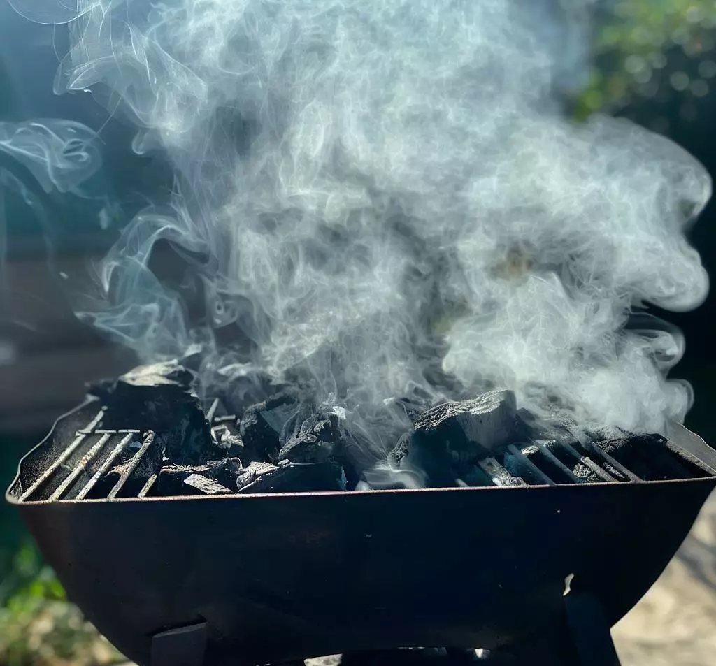 Why is my charcoal grill smoking so much? all the reasons you should know