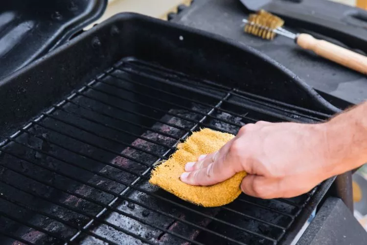 How often should I clean my grill after using a fire extinguisher