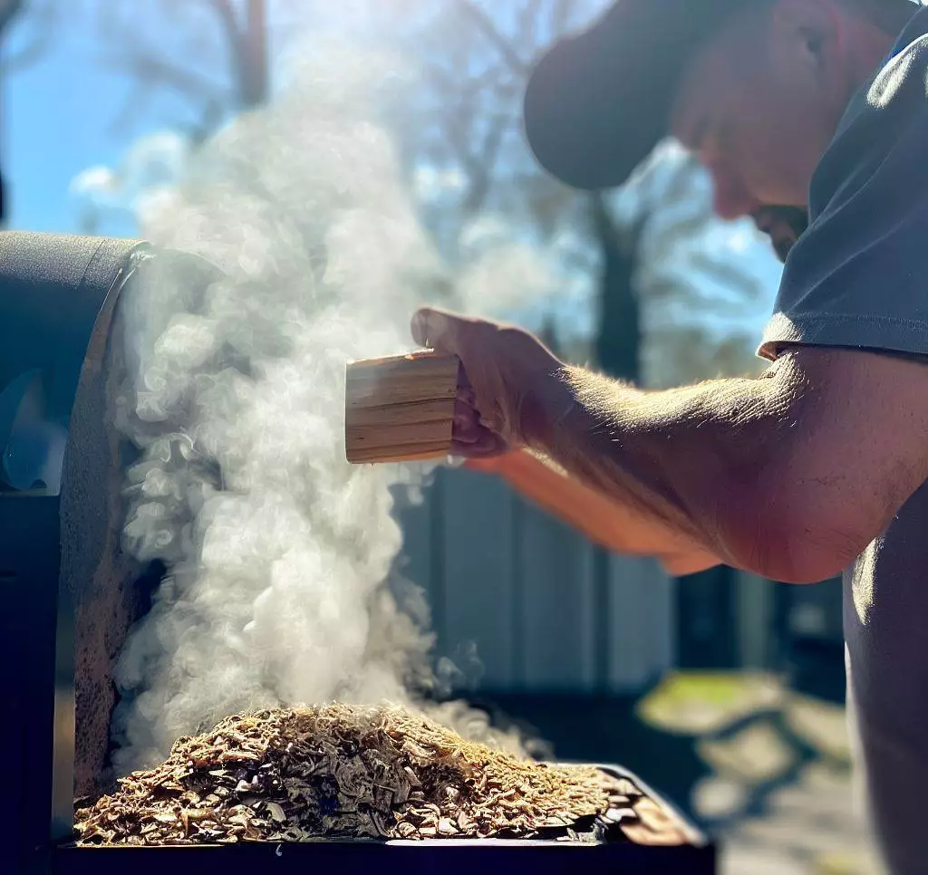 Why is using wood chips in a pellet smoker Risky